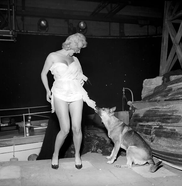 Actress Liz Fraser seen here having a little trouble with one of her co-stars on set at