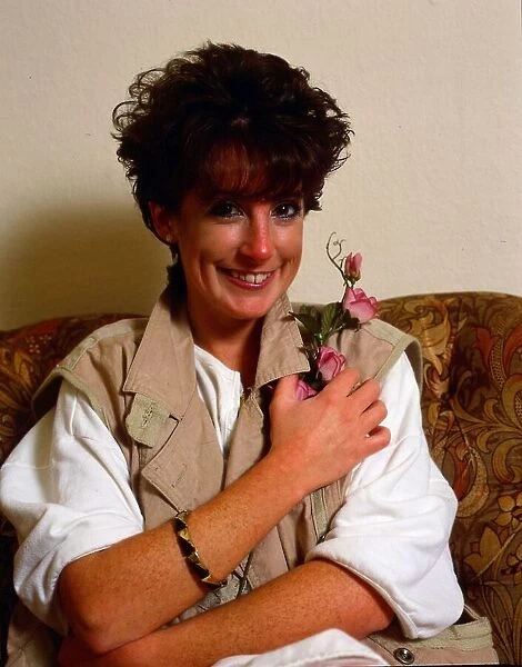 Amanda Kirby holding a flower November 1984