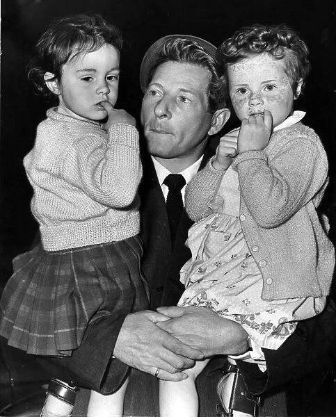 American actor and comedian Danny Kaye pictured with polio sufferers Maureen Allan