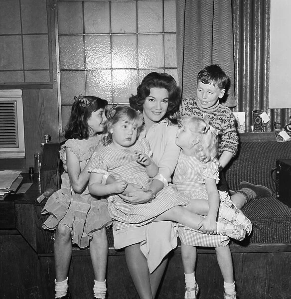 American singer Connie Francis pictured with her adopted children
