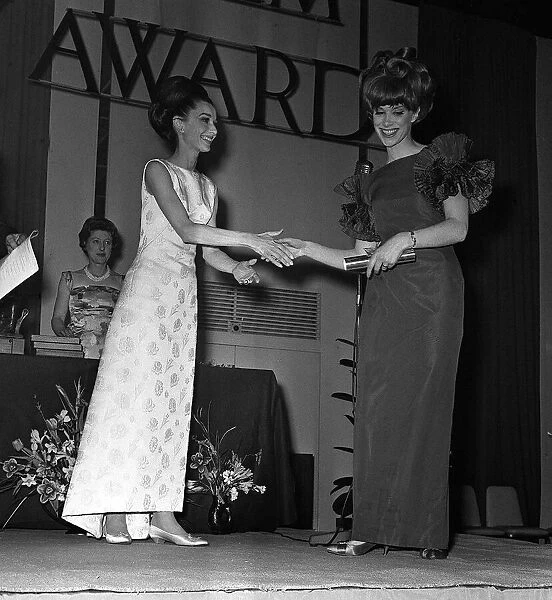 Audrey Hepburn April 1964 presents actress Wendy Craig at award ceremony