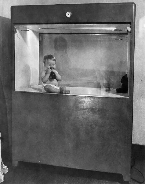 Baby lives in box. April 1948