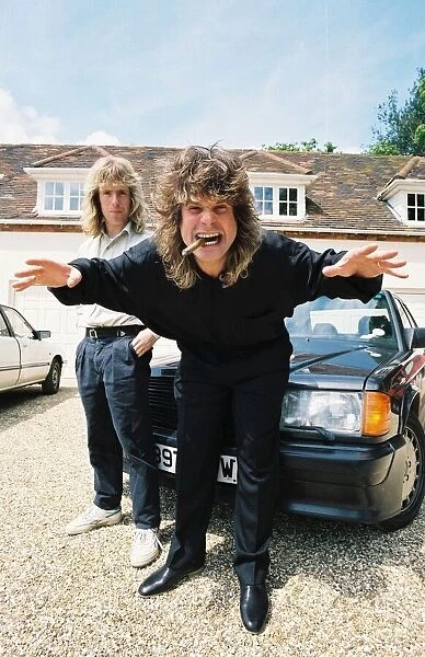 Black Sabbath singer Ozzy Osbourne with his car at his home. May 1988
