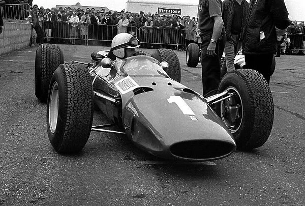 British Grand Prix 1965 Silverstone July 1965 John Surtees sits in his Ferrari