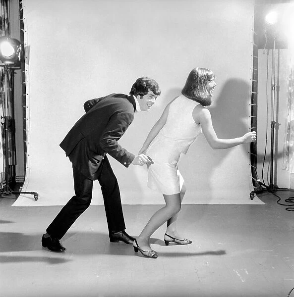 Couple dancing the 'Bend'. 1960 A1202-002
