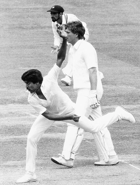 Cricketer Kapil Dev - Indian fast bowler in action against England at Lord s