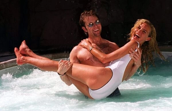 Darren Day and Tracey Shaw frolic in the pool in Las Vegas