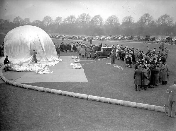 A demonstration of a barrage balloon being inflated on the Downs in 1939