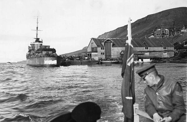 Destroyer waiting at a jetty at Barentsburg in the Svalbard Islands to take Russian
