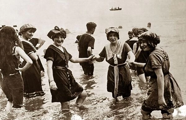 Edwardian Ladies in their bathing costumes paddling in the sea Clothing Women