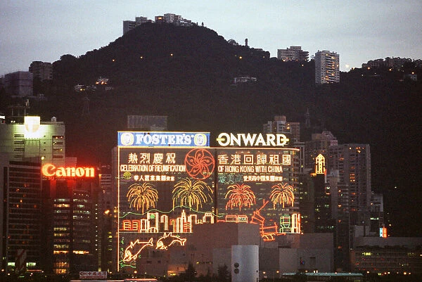 General view of the illuminated skyline at night time in Hong Kong
