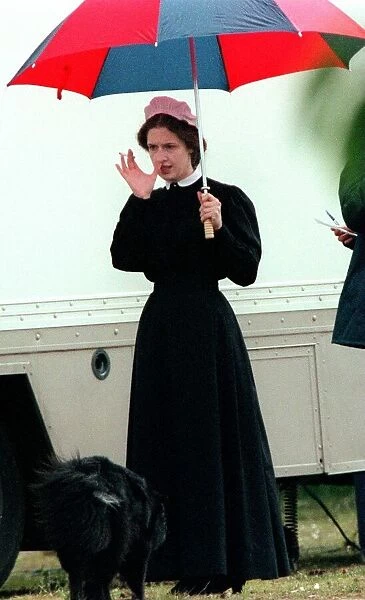 Gillian Anderson X Files actress wearing Victorian costume June 1999 smoking between