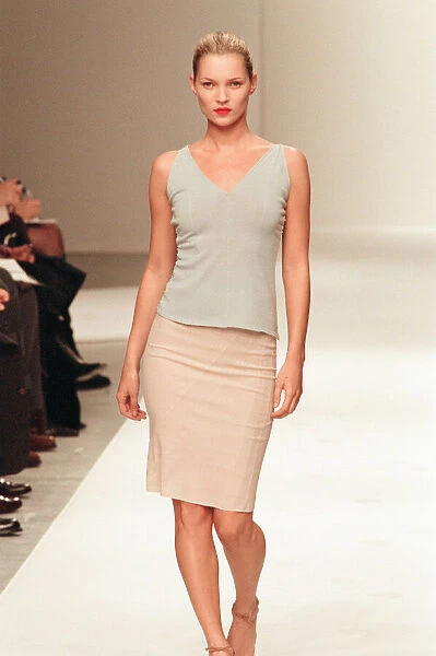 Kate Moss at Milan Fashion Week October 1997 modelling Narcisco Rodriguez blue v neck top