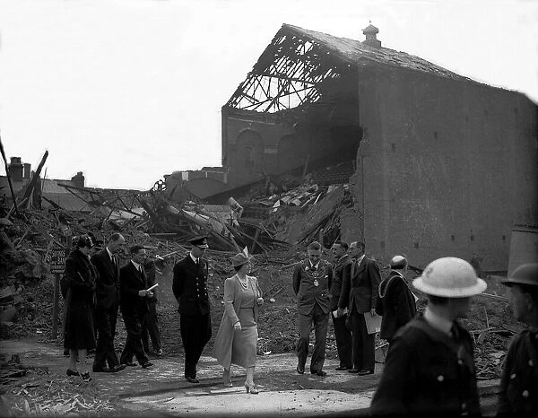 King George VI and Queen Mother visit Hull August 1941 looking at Bomb damage