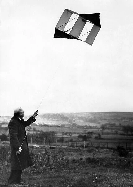 Kites. Mr. Albert Norris pictured flying his kite. October 1953 P012324