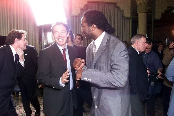 Lennox Lewis boxer with Tony Blair Prime Minister May 1999 at the Mirror Pride of