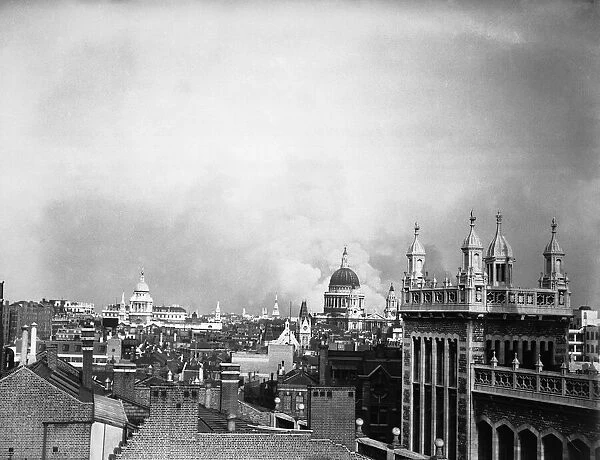 London Blitz Bomb Damage 1940 WW2 Smoke rises from behind the dome of St Pauls