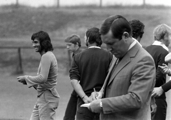 Manchester United manager Frank OFarrell taking notes during a training session with