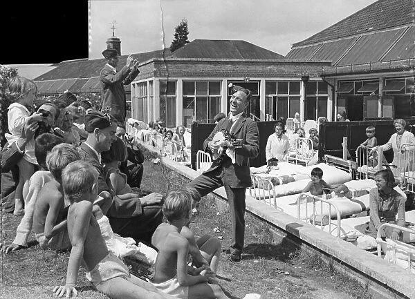 Members of the RAF entertain the children at a childrens hospital. Location unknown