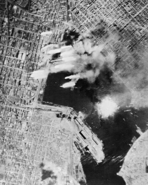 This photograph, taken during a night attack by Allied aircraft on Piraeus harbour
