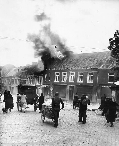 Picture shows the scene of an German Air Raid on a Belgium Town