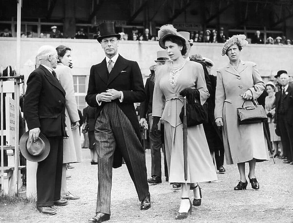 Princess Elizabeth pictuerd with her father King George VI leaving the Royal Box for