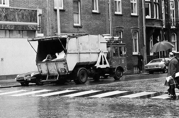 A refuse collector working on the Kings Road, London. 4th December 1970