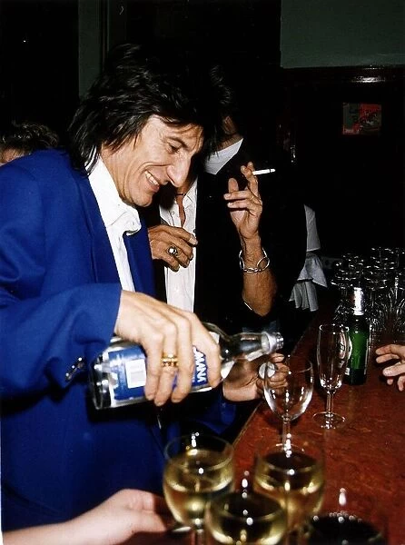 Ronnie Wood Rolling Stones pours drink Circa 1992