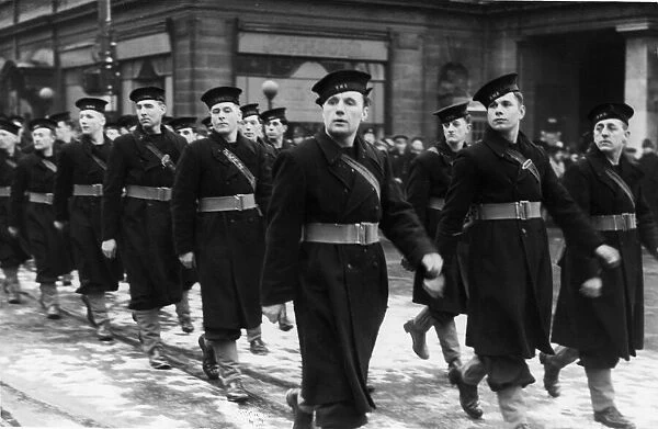 Sailors of the Royal Navy parade past the City Hall in Hull during the Second World War