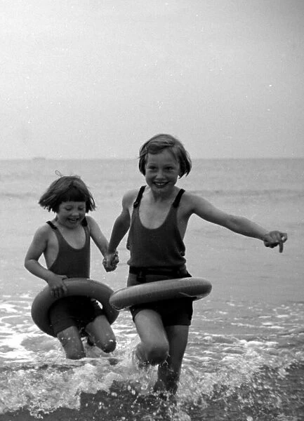 Summer Holidays, children p[addling in the English Channel at Hove Circa 1937