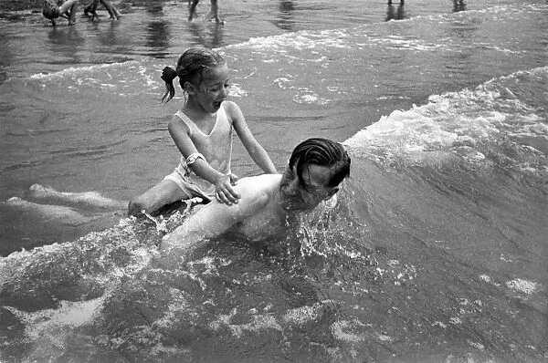 In surf at Brighton - Gladys Tester. August 1952 C3867-001