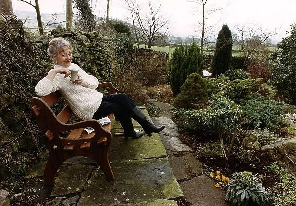 Thelma Barlow actress Mavis in Coronation Street taking a break from gardening at home