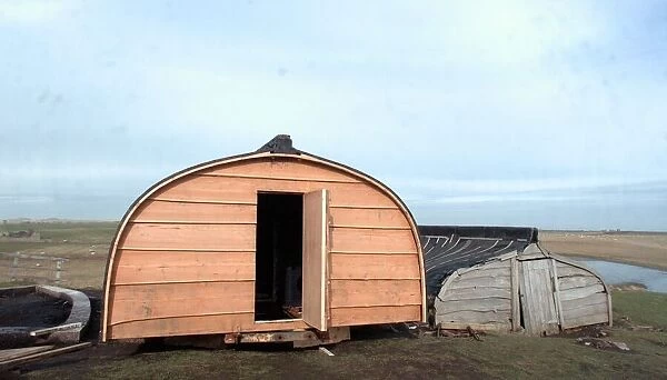 The upturned boats used as huts on Lindisfarne (Holy Island)