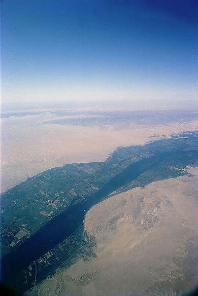 The desert areas crossed by the green ribbon of the Nile (aerial view)