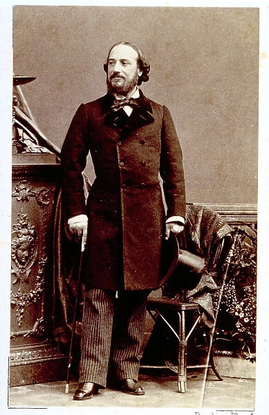 Full-length portrait of a man in day dress with a top hat and cane