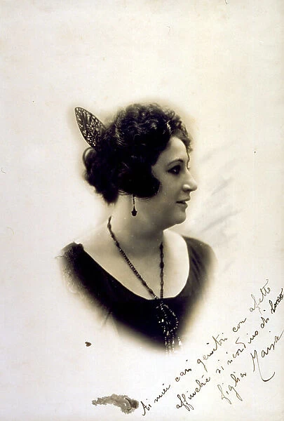 Half-length portrait of a lady in profile with a barette, earrings and a necklace
