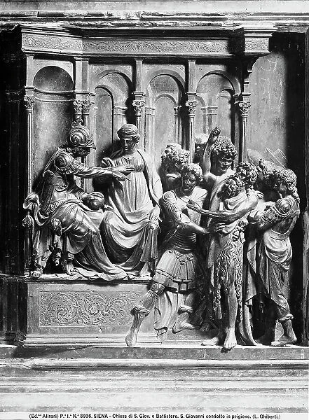 Panel portraying St John the Baptist led by Herod. Sculptural work by Lorenzo Ghiberti, part of the Baptismal Font from Siena Baptistry