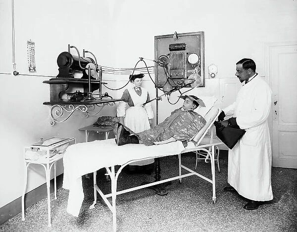 Patient at the Pellizzari Institute in Florence, assisted by a doctor and a nurse, during a therapy session