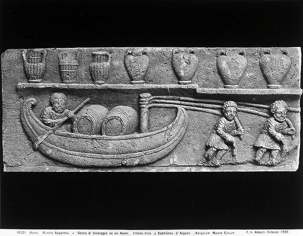 Scene of a loaded ship; relief traced to Cabrires d'Aigues and preserved in the Calvet Museum of Avignone. The work was displayed at the Augustea Exhibit of the Roman World held in Rome in 1937-1938