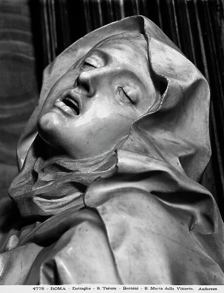 St. Theresa transfixed by the love of God, face detail. Detail of the sculptural group by Gian Lorenzo Bernini. Cornaro Chapel, church of Santa Maria della Vittoria, in Rome
