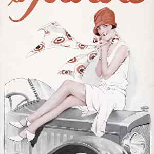 1920s women sitting on the bonnet of a car