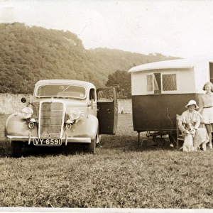1935 Ford Four-door Sedan Vintage Car with Caravan, England