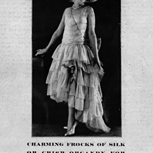 Advert for Oppenheim Collins & Co New York - charming frocks Date: 1928