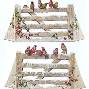Birds perched on gates on two cutout Christmas cards