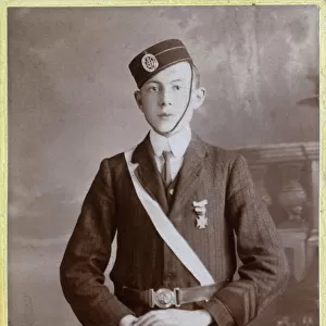 Boys Brigade Member posing with rifle