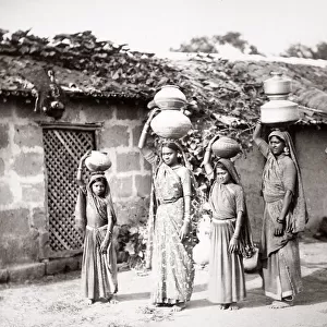 c. 1880s India - women carrying water in pots