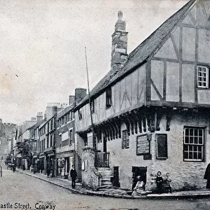Castle Street, Conway, with timbered houses and castle