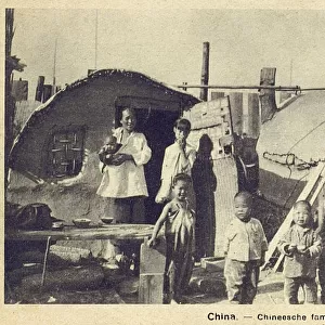 China - Poor Chinese family in simple small dwellings