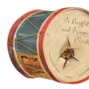 Christmas card in the shape of a drum with dog