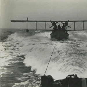 Curtiss H12 Large America on a lighter under tow at sea
